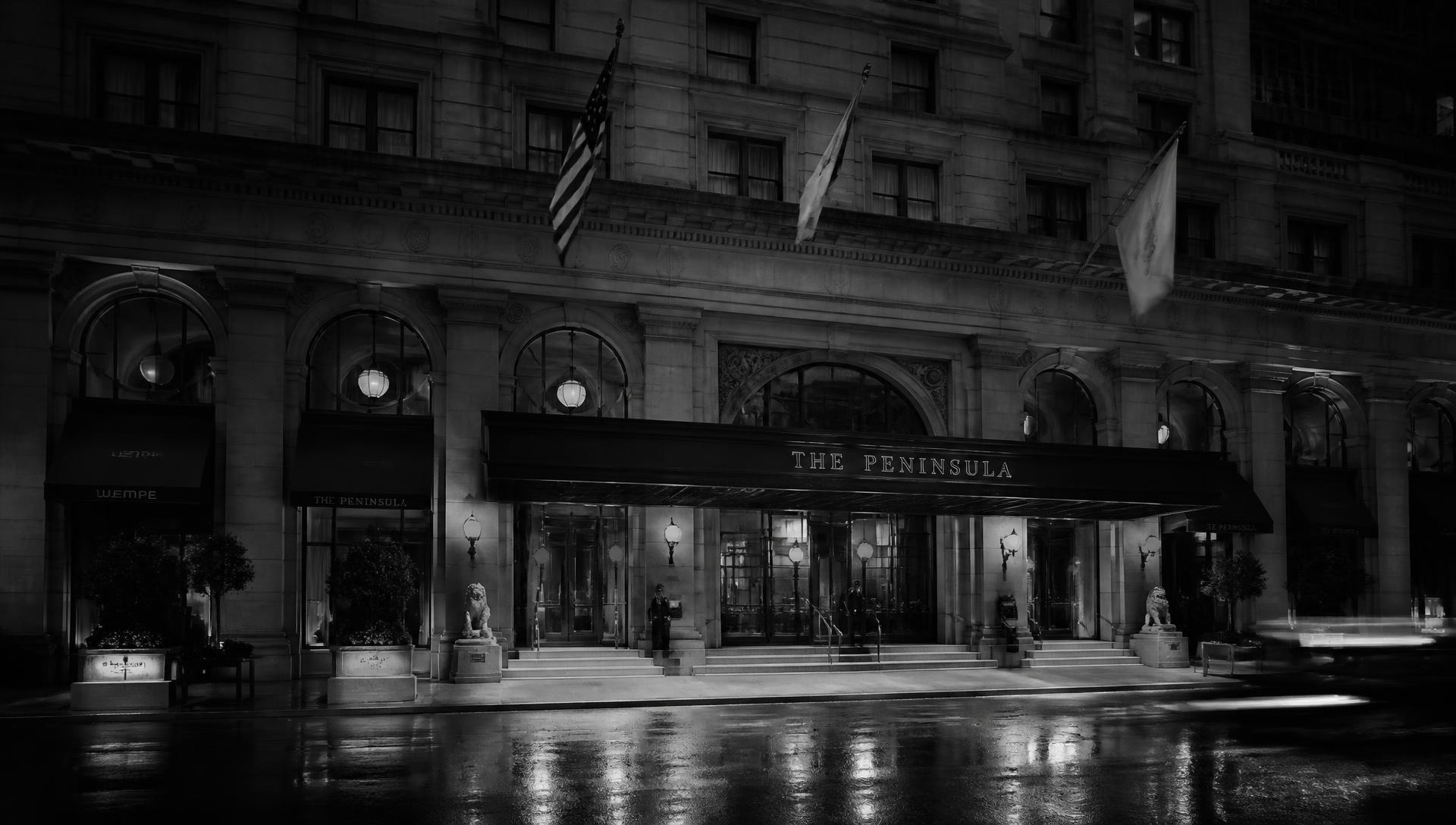 Facade of a historic luxury Manhattan hotel at dusk