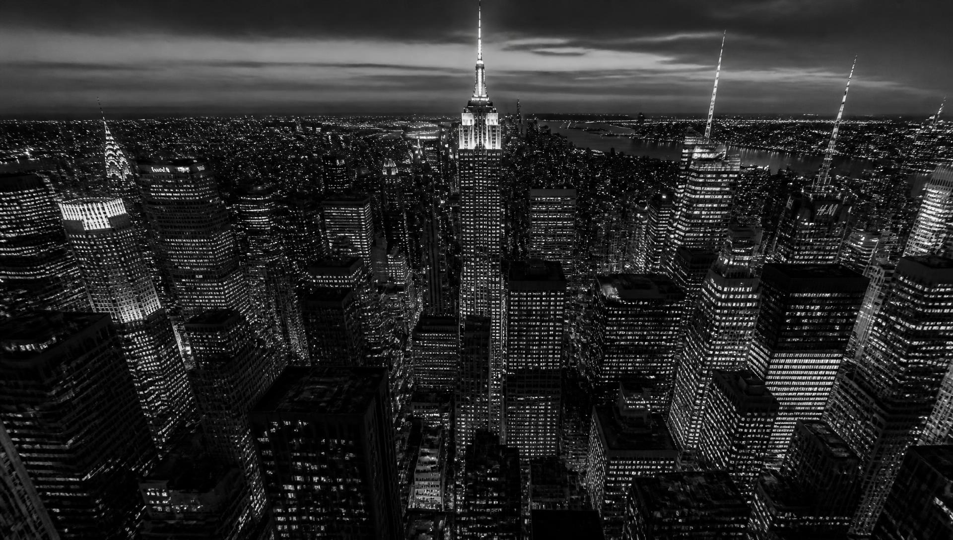 Aerial view of Midtown Manhattan skyscrapers at dusk